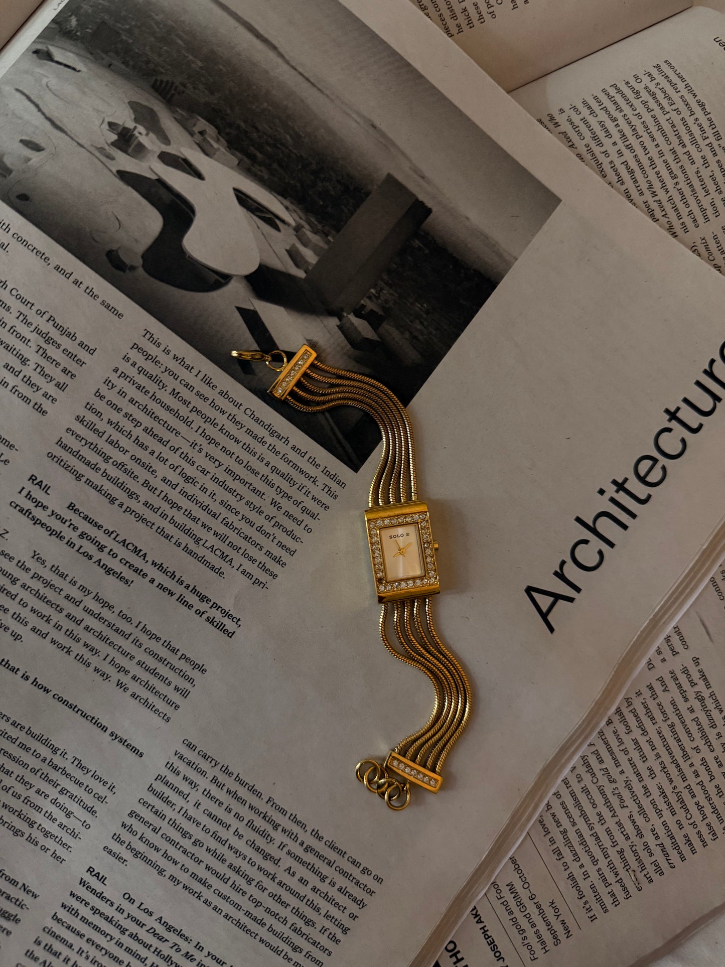 Gold bracelet embellished rectangle face watch