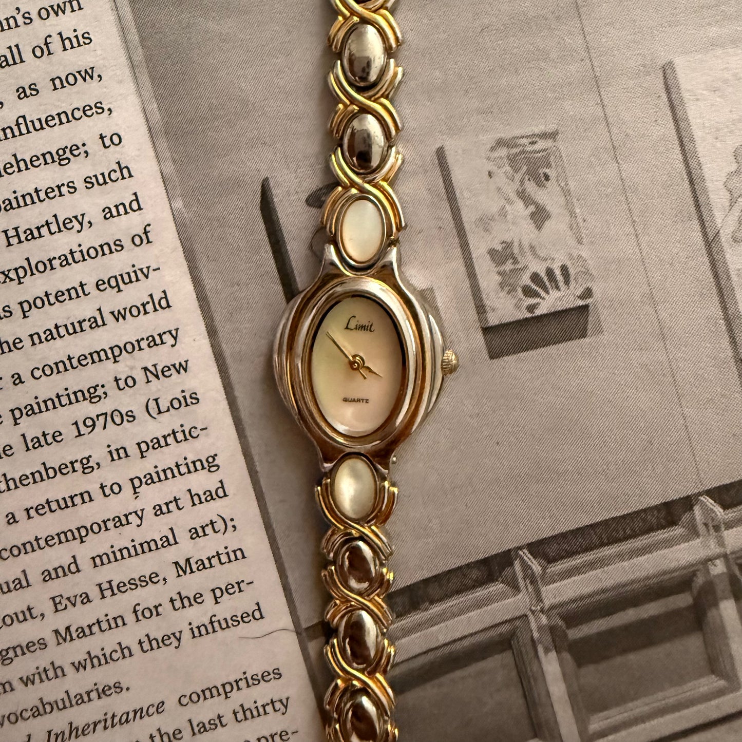 Two tone XO oval band watch