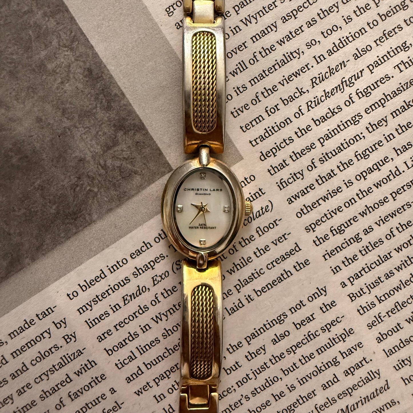 Two tone mesh cuff oval watch