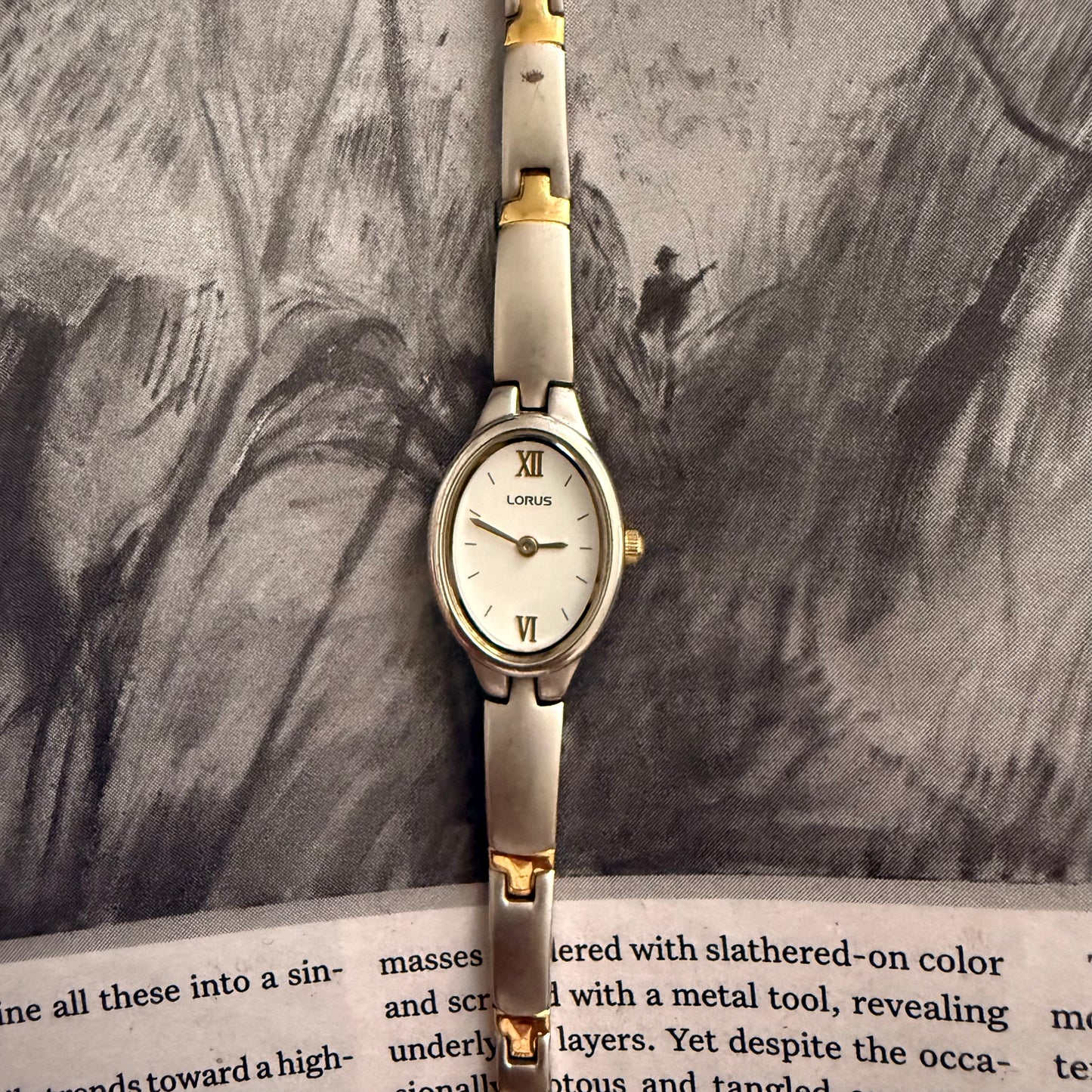 Two tone matte slim oval watch