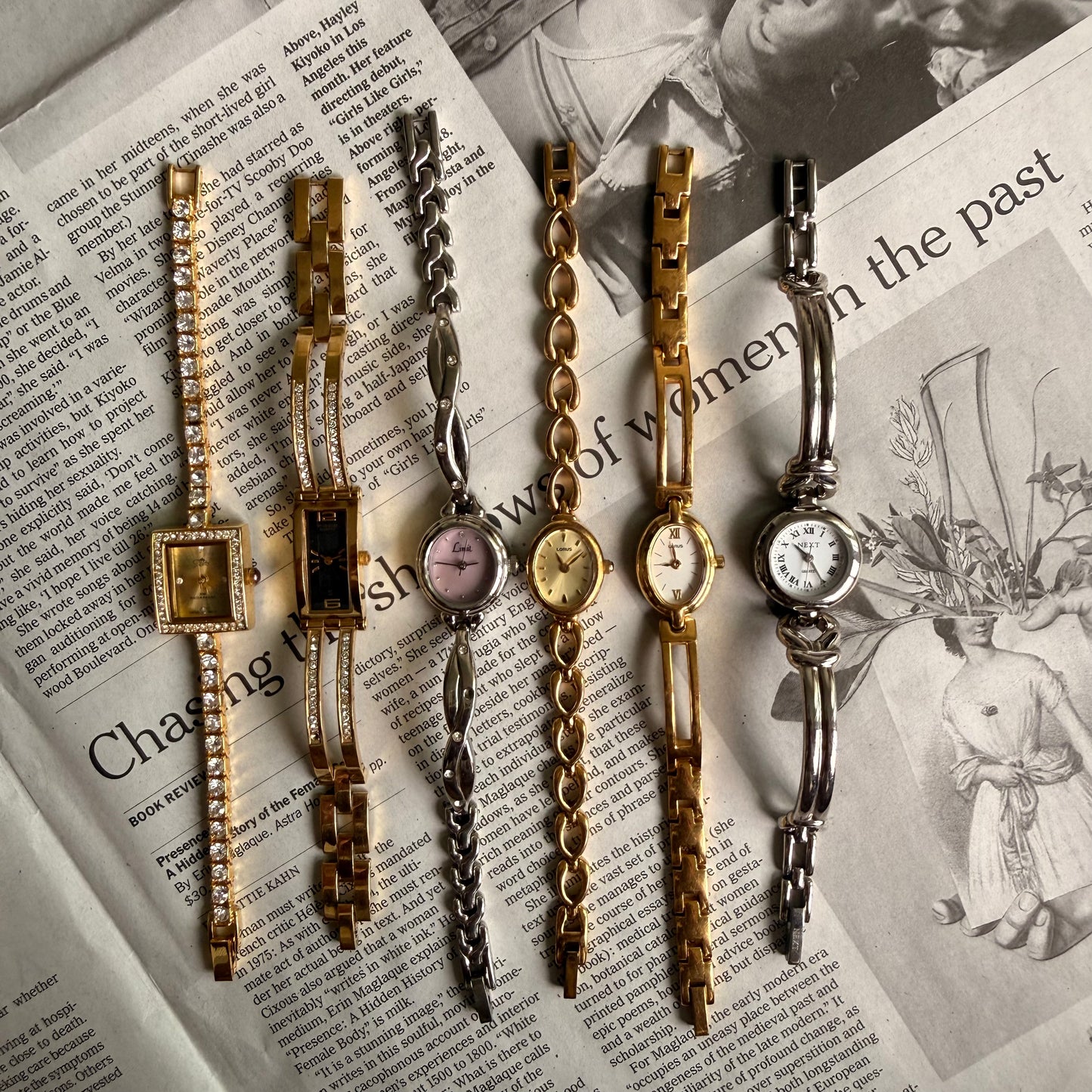 Gold rectangle black face tennis cuff watch