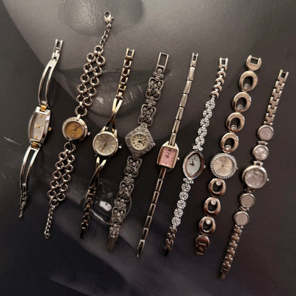 Silver circle gold face bracelet watch