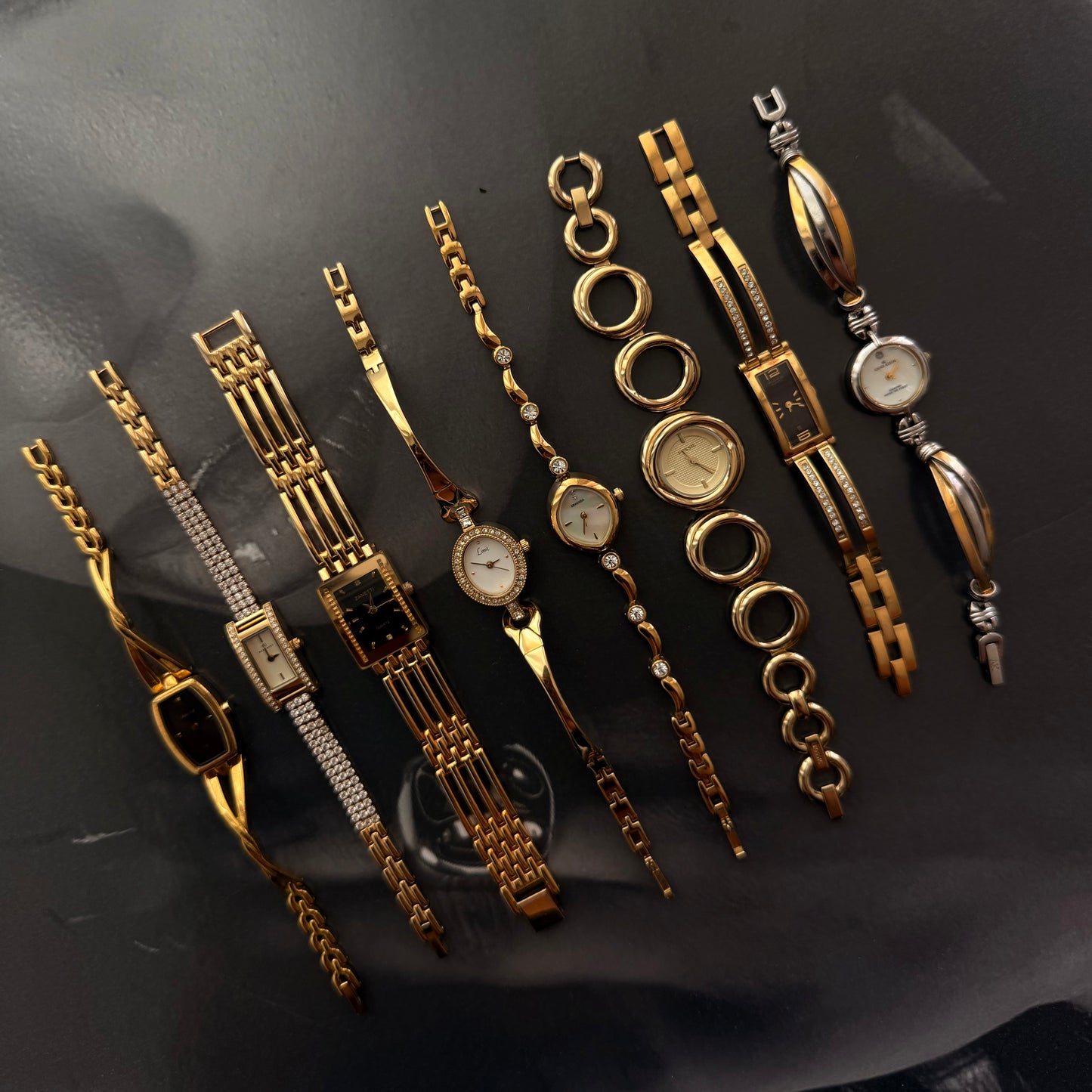 Gold rectangle face ladder band watch