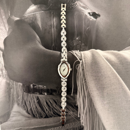 Silver oval face jewel band watch