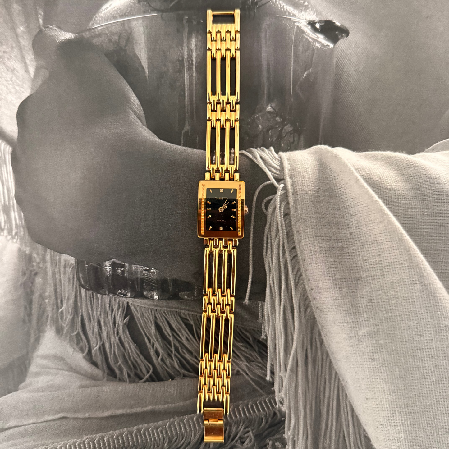 Gold rectangle face ladder band watch