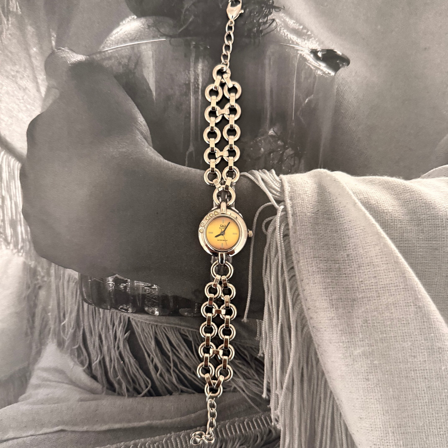 Silver circle gold face bracelet watch