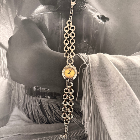 Silver circle gold face bracelet watch