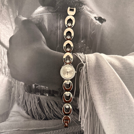 Silver circle face gemmed link band watch