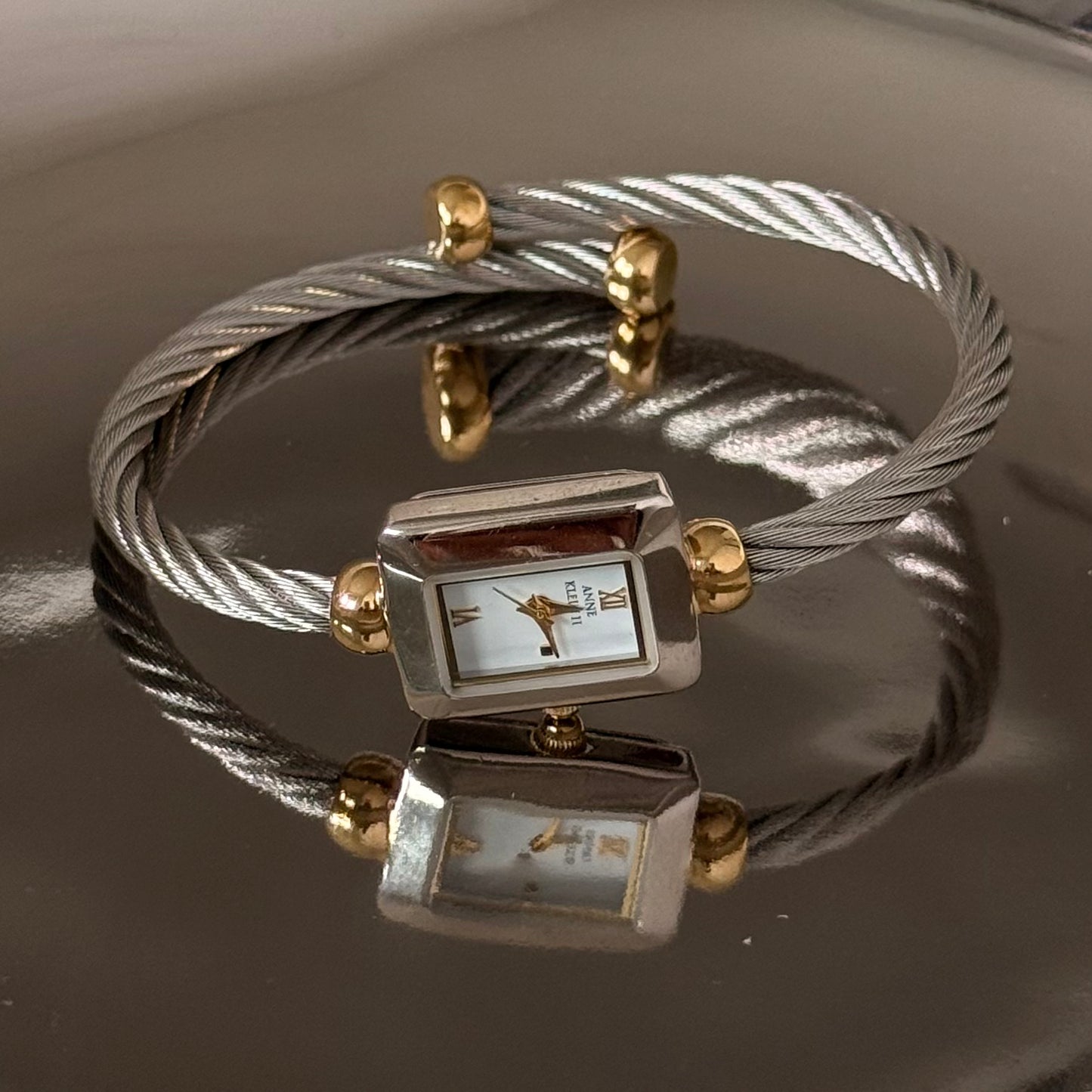 Two tone square twist cuff watch