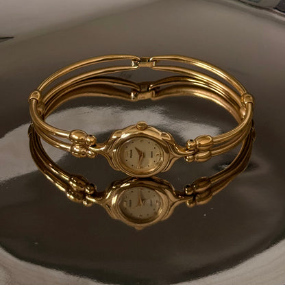 Gold circle face hoop bangle watch
