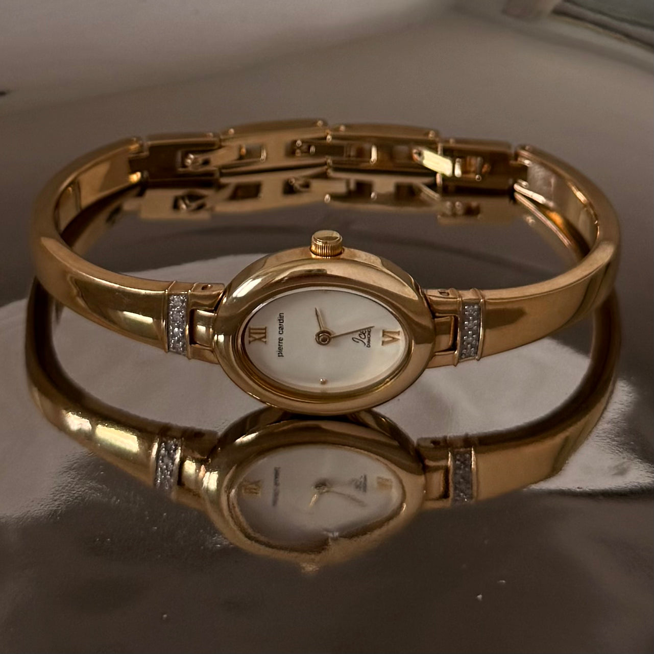 Gold circle gem detail cuff bangle watch