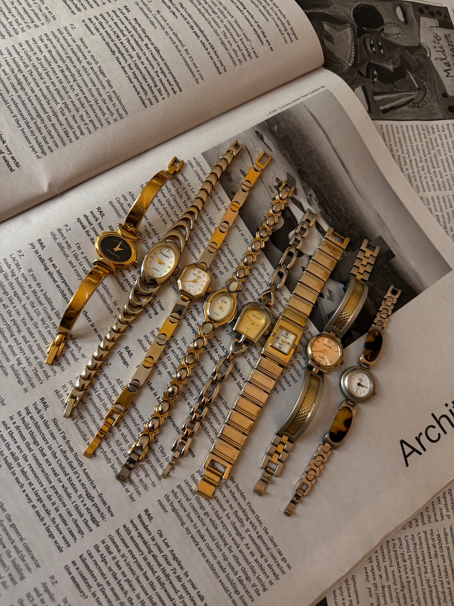 Two tone crescent oval watch