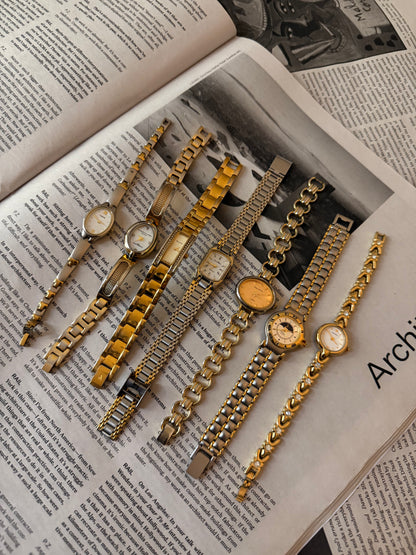 Peach face oval link silver watch