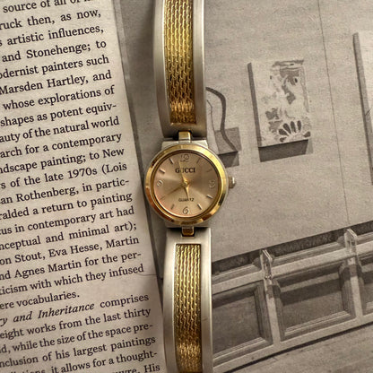 Gucci matte two tone mesh cuff watch