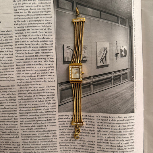 Gold bracelet embellished rectangle face watch