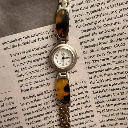 Silver circle tortoise band watch