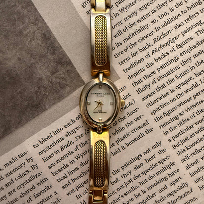Two tone mesh cuff oval watch