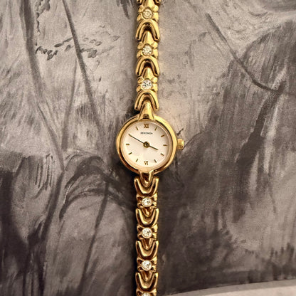 Gold slim circle embellished watch