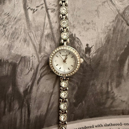 Silver slim circle embellished watch