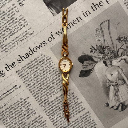 Croissant style twist cuff watch