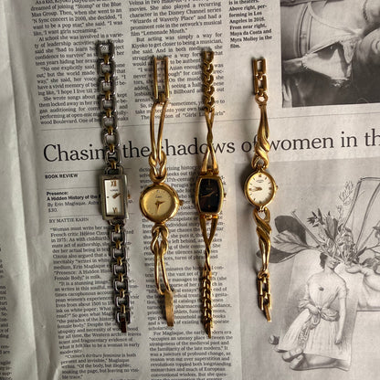 Cross style twist band watch