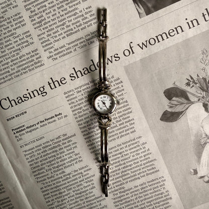 Croissant style twist cuff watch